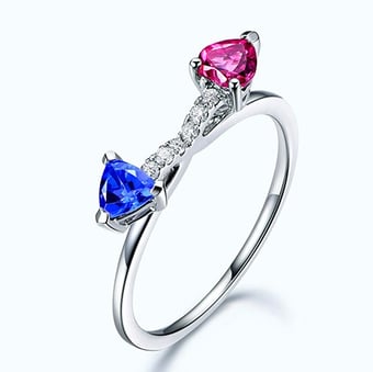 Bague croisée des chemins. Or blanc et saphirs